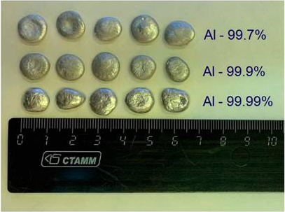 View of aluminum granules used
in experiments. Aluminum of varying chemical purity was used: 99.7%, 99.9%, and 99.99%